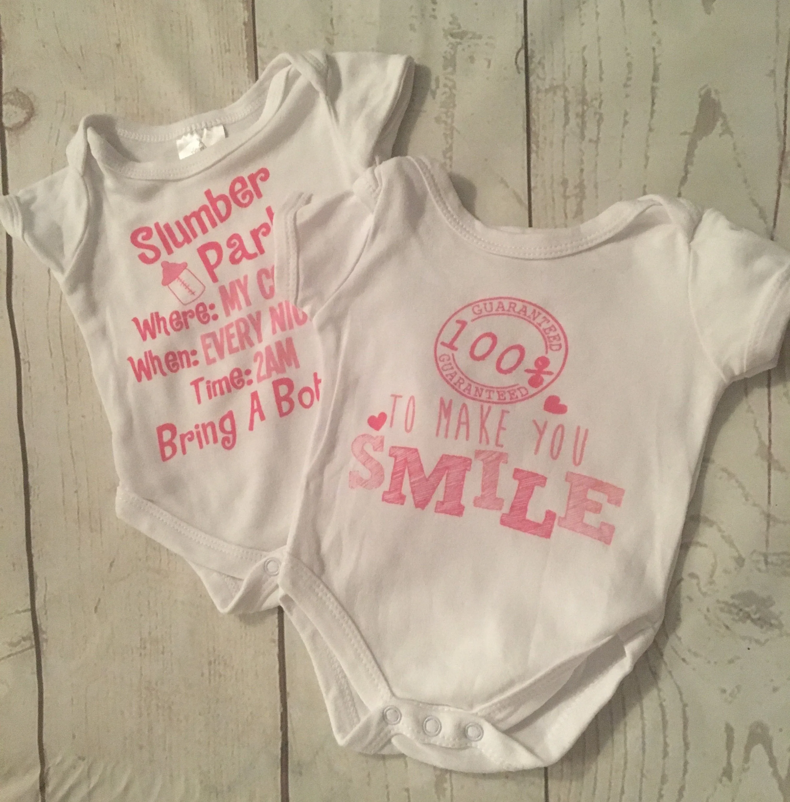 0-3 Months Slogan Bodysuits x2